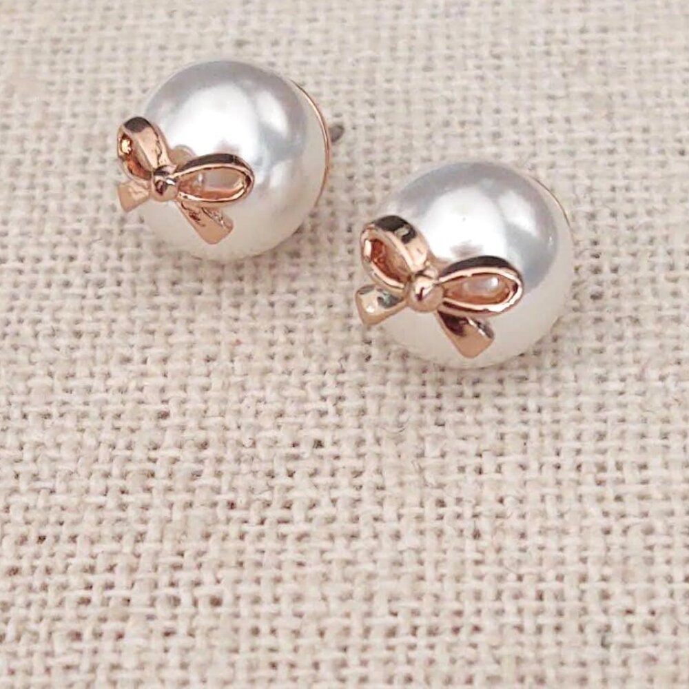 Faux pearl stud earrings with gold bows